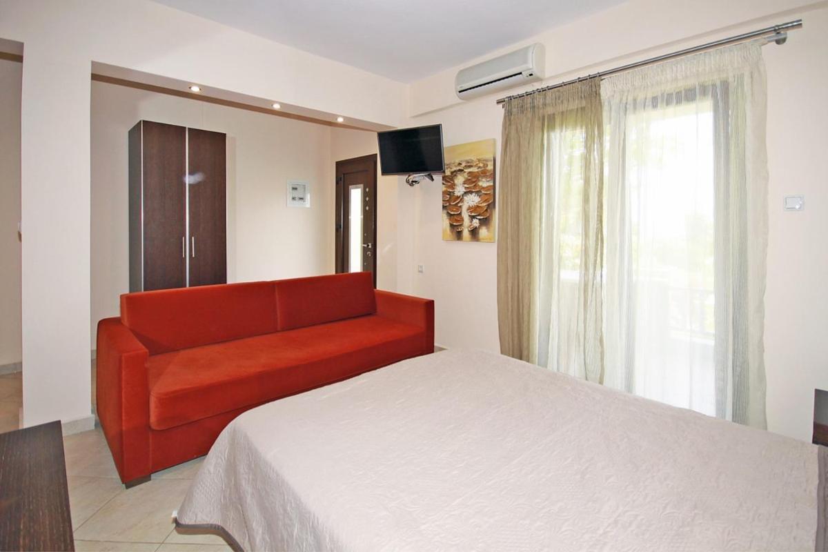 Stamos Apartments And Studios Vourvourou Rom bilde